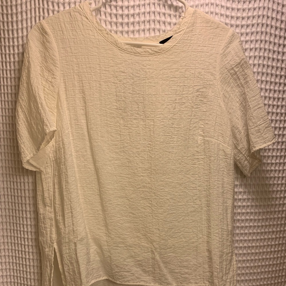 White linen high/low cutout blouse